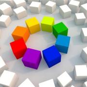 A graphic of a circle of colored blocks surrounded by white blocks