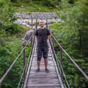 Alex Fiel on a suspension bridge.