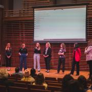 Winners of Femal Founder's Night on a stage.