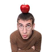 Photo of a man with an apple on his head