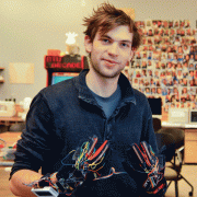 Kristoff Klipfel wearing his piano gloves