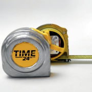 A tape measure clock with a view of the outside and inside.