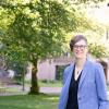 Kate Starbird standing outside on a sunny day
