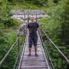 Alex Fiel on a suspension bridge.