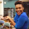 Kaylee Arnold holds a tarantula at an outreach event she led in Athens, Georgia.
