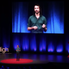 Carson on stage during TEDx talk