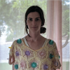 Laura Devendorf wearing a shirt she crocheted that has baby nipples sewn into it.
