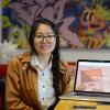Emma Wu displays website she designed and built.