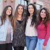 Four women, who will be graduating from TAM in December, stand in front of the Roser ATLAS  building.