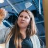 fiona bell peels bioplastic from window