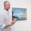 Kevin Hoth teaching in front of an image.
