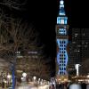 Denver's Daniels and Fisher tower lit up at night.