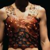 woman wearing tank-top style shirt made from kombucha scobe with led lights embedded