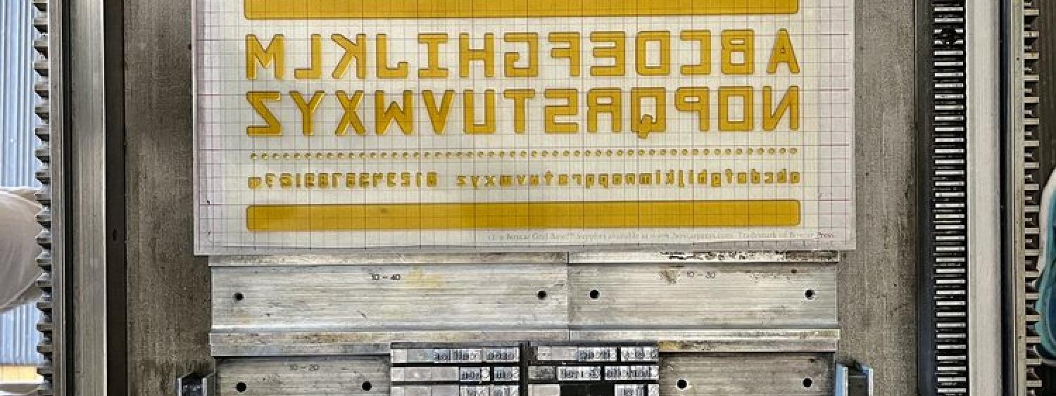 Image of Clews typeface on press