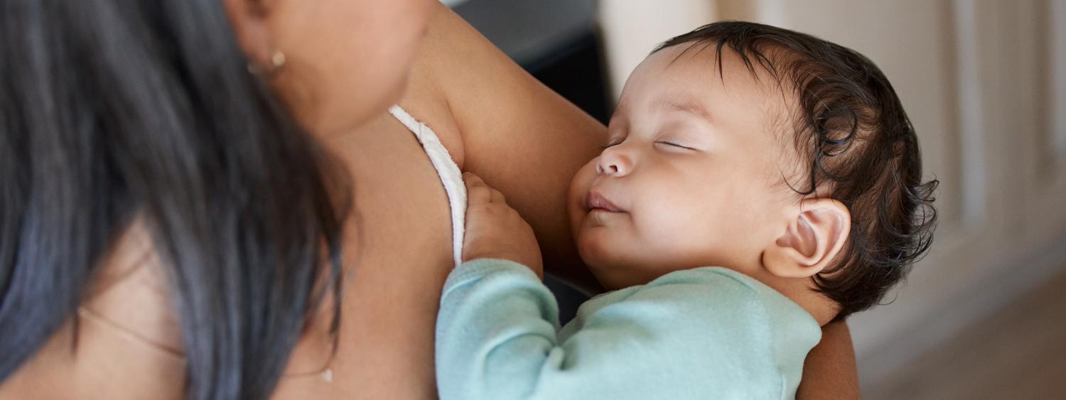 Woman holding a baby in her arms