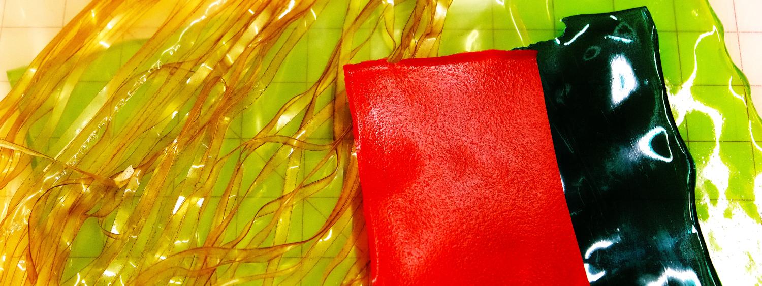 Plastic materials and strands in orange and green