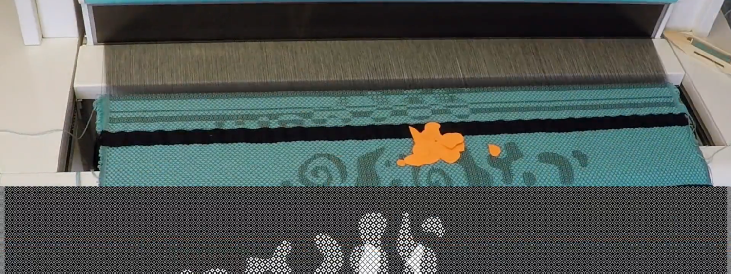 Fabric being woven