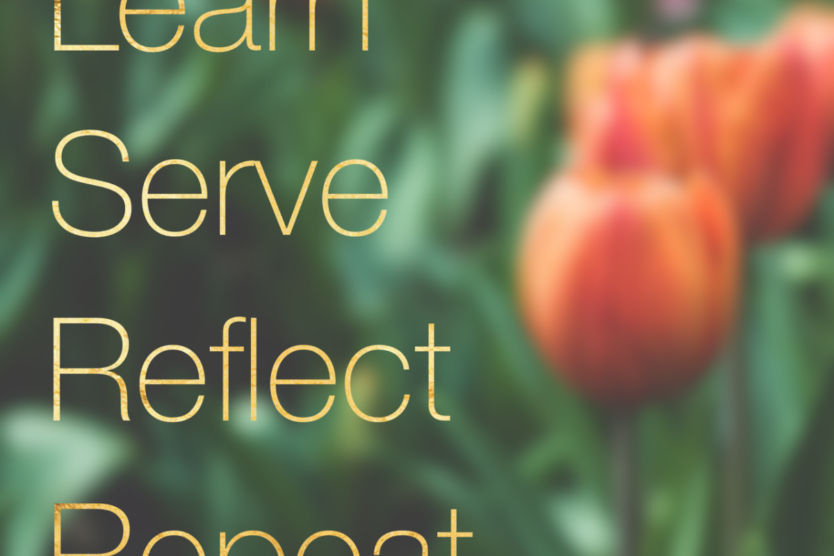 Learn, Serve, Reflect, Repeat in front of flowers