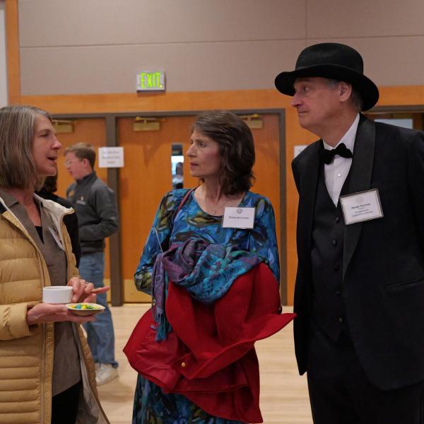 Awardees and guests mingle at reception