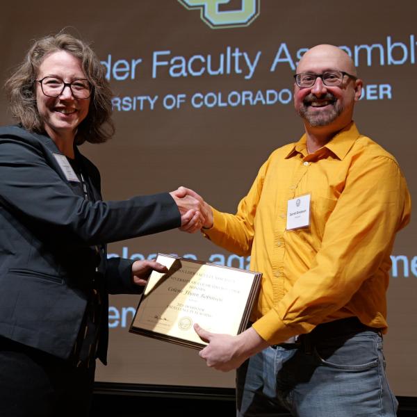 Excellence in Teaching Awardee Colene Robinson and Selection Committee Chair Garrett Bredeson