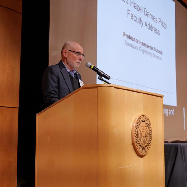 Provost Moore introduces Hazel Barnes awardee Hanspeter Schaub