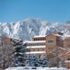 CU campus spring snow and mountains