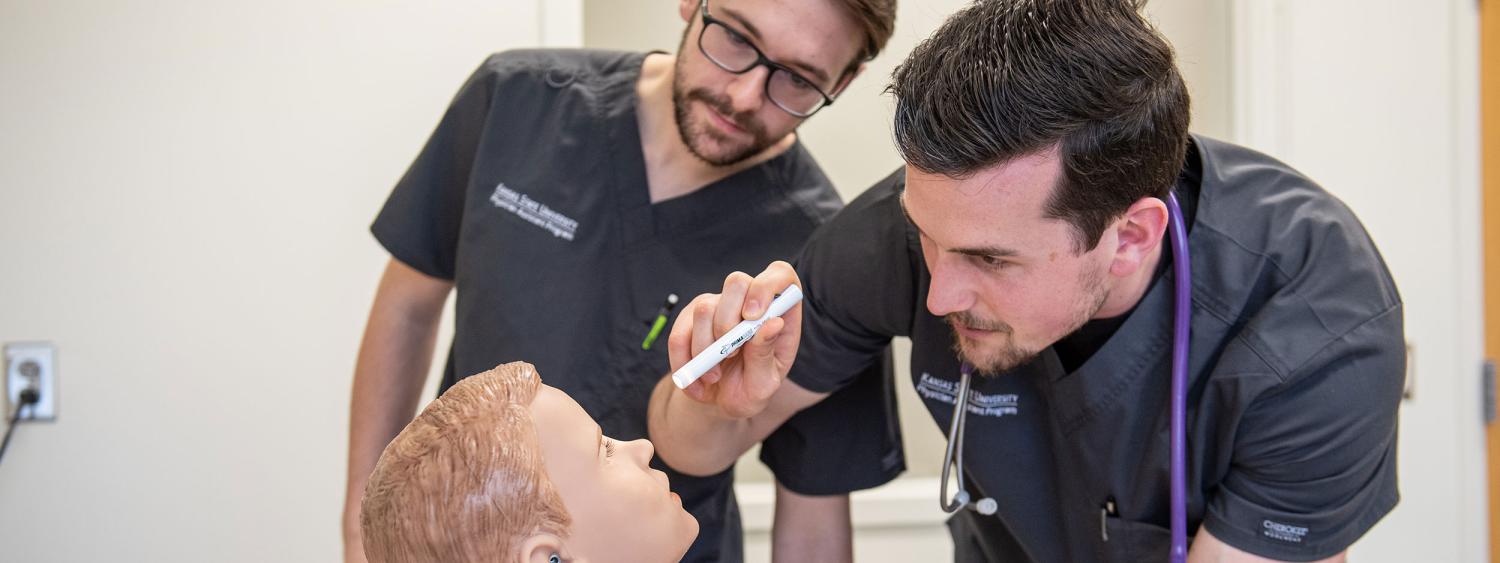 Nursing students shine light into mannequin’s eye