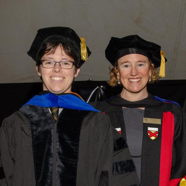 Lynn Sanford, Ph.D. hooded by Associate Chair and Advisor Amy Palmer