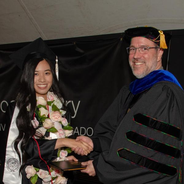 Chair, Jim Goodrich and Elizabeth Ly, BA