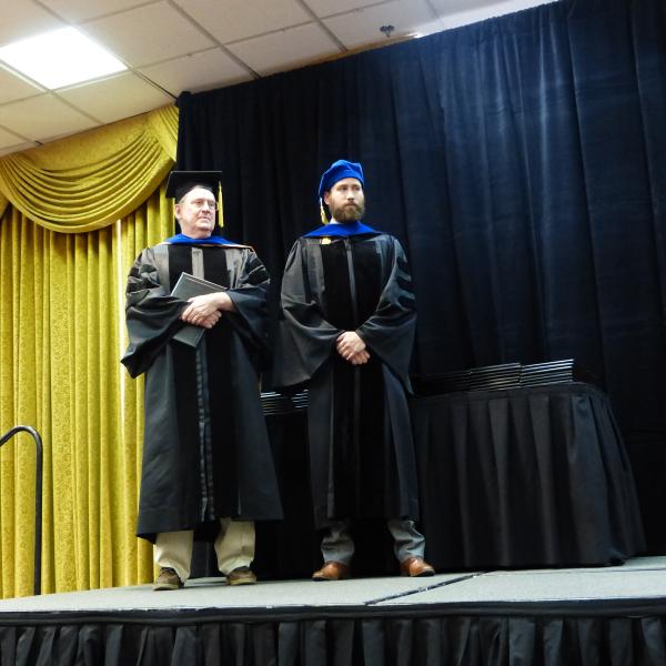 Chair, Carl Koval and Ph.D. graduate, Kyle Carter