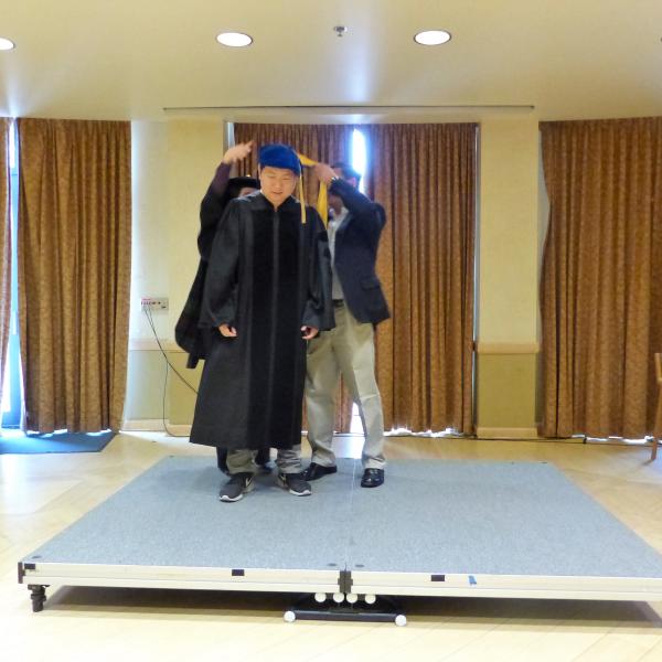 PhD Graduate being Hooded