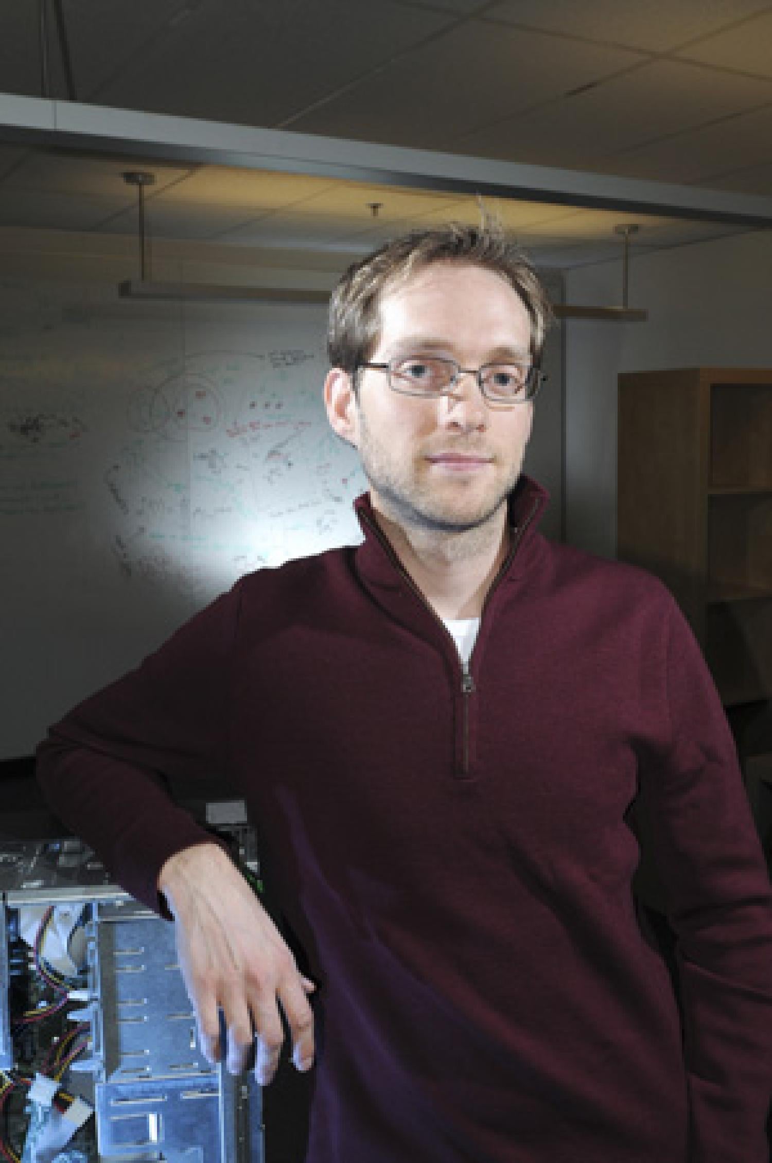 Biofrontiers computer scientist, Aaron Clauset, brings the power of computing to unlock biological mysteries. (Photo: Patrick Campbell, University of Colorado)