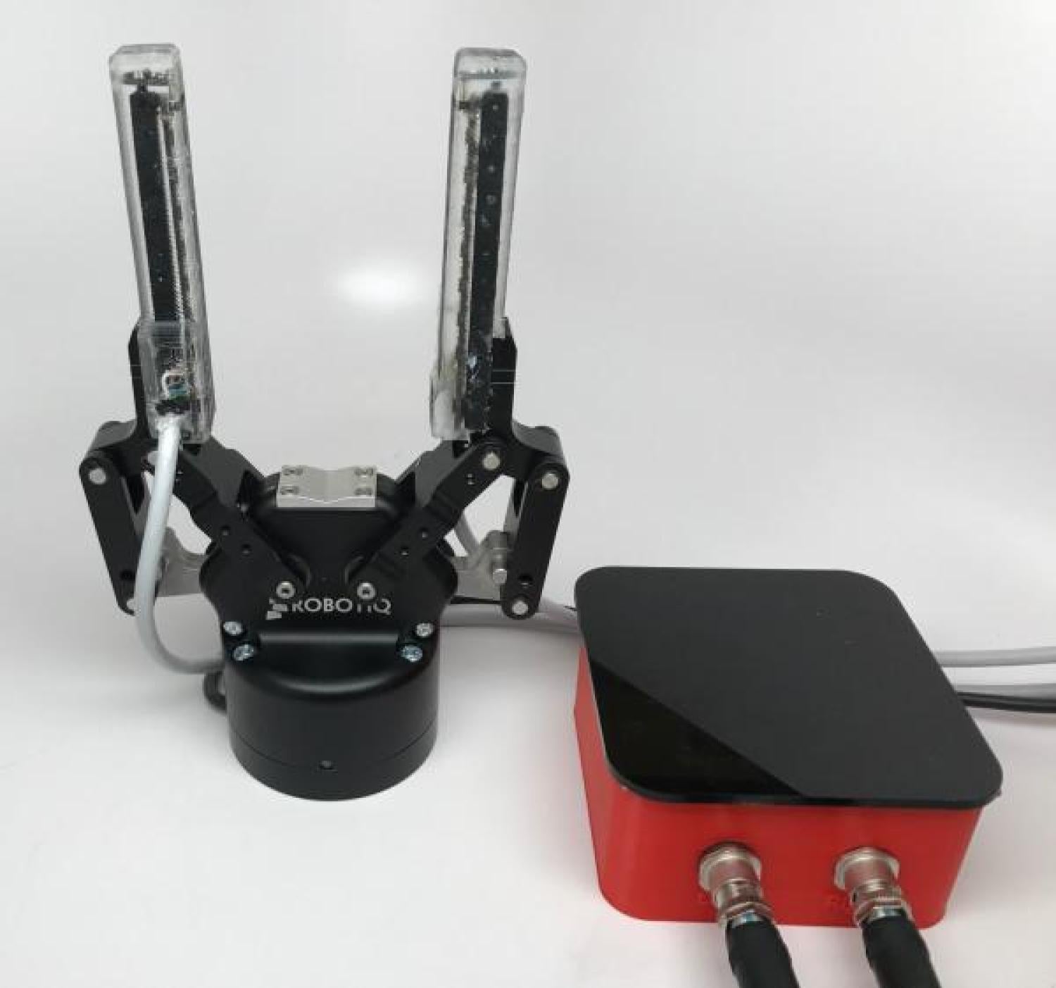 Tactile sensors mounted on a commercial gripper (Nikolaus Correll)