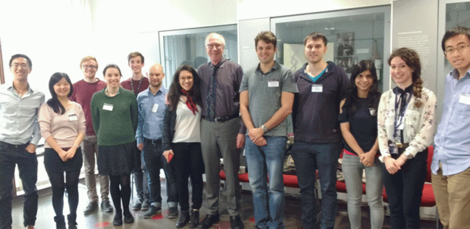 Image of Professor Cech with students courtesy of the Department of Chemistry