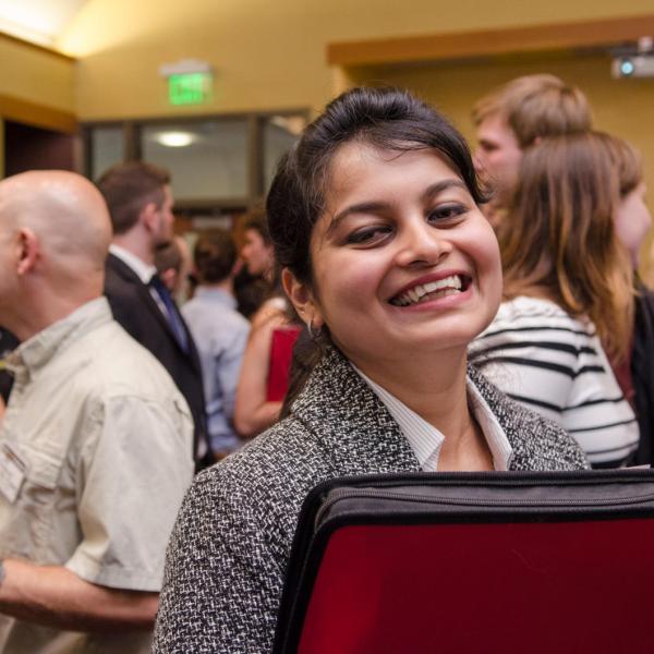 Person smiling at career fair