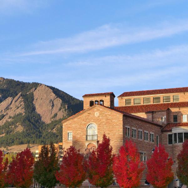CU Boulder Center for Community building with mountains in background