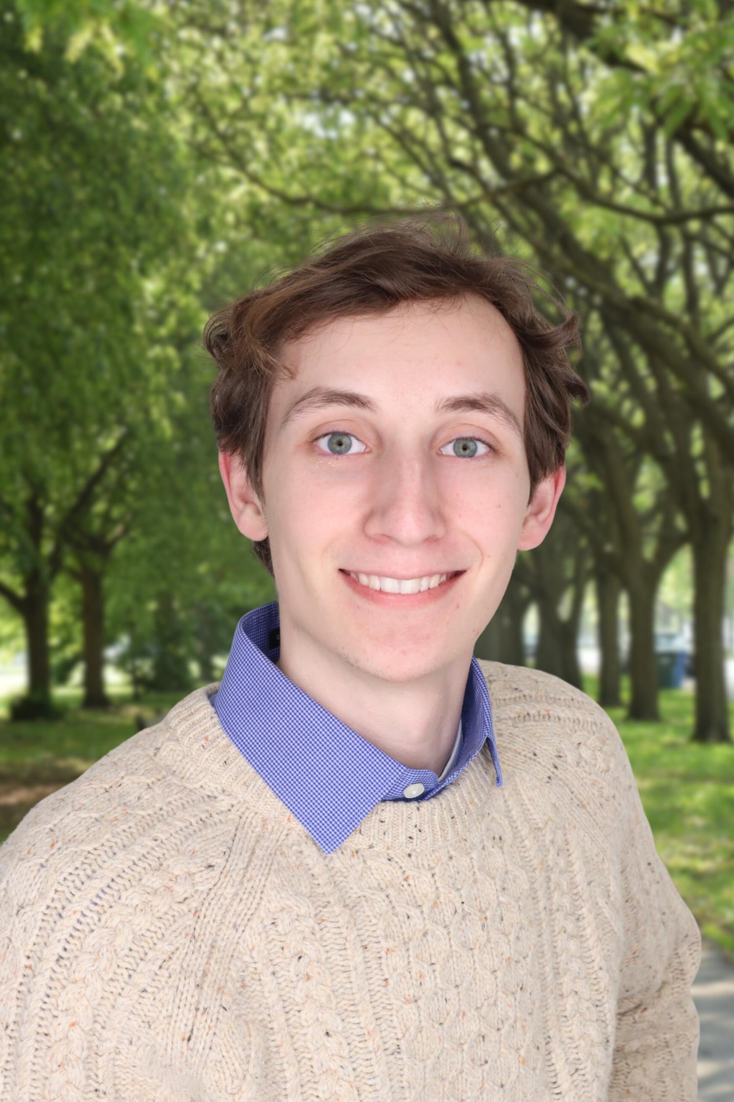 Jackson Fairborn, young man with brown hair in a sweater.