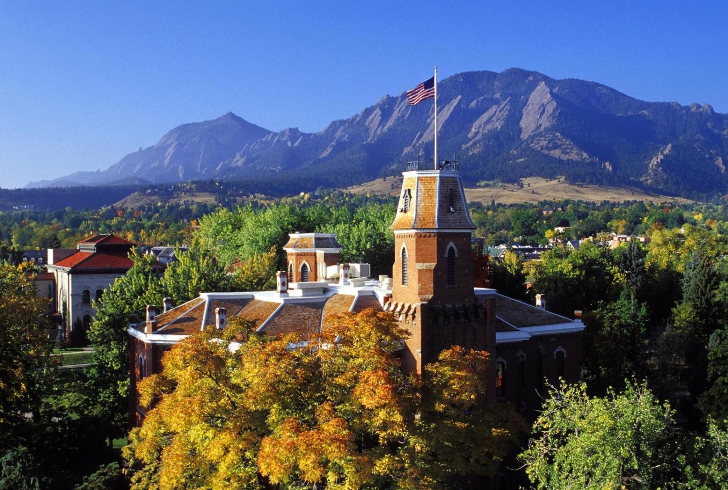 Old Main with flatirons in the background