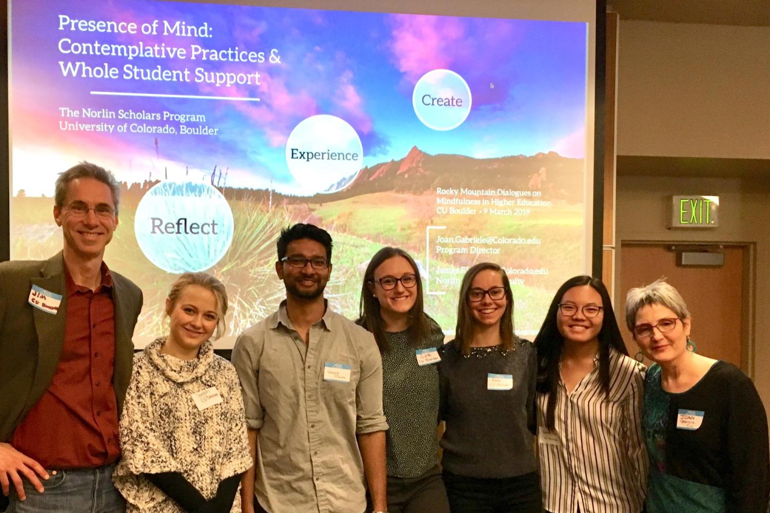Students in front of presentation screen
