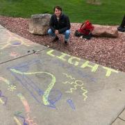 Student and chalk art