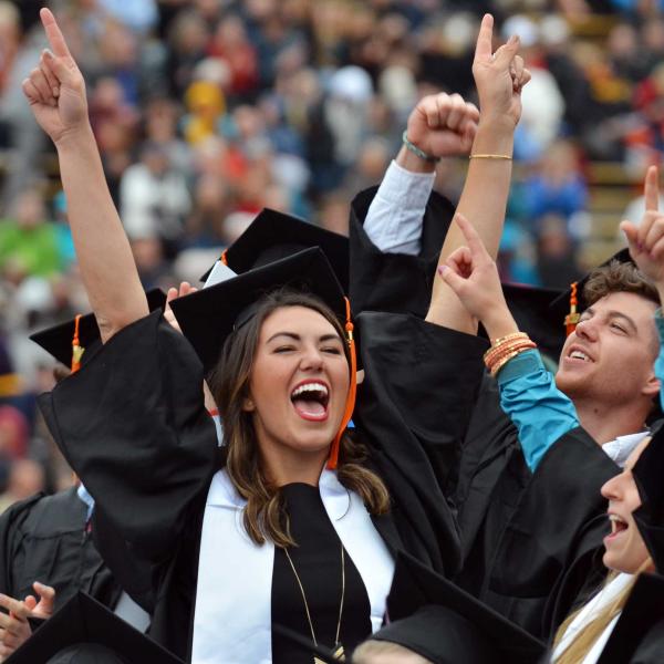 Graduates celebrate during spring commencement.
