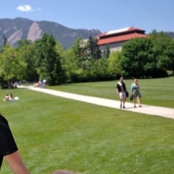 A CU Ambassador leads a tour through the quad. Shallow depth of field helps focus your attention on the subject and gives images a more sophisticated look that is very contemporary.