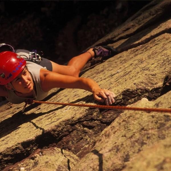 A student climbs a rock in Boulder Canyon. Be Boulder platform refrains from using odd angles unless it’s necessary, such as in this situation.