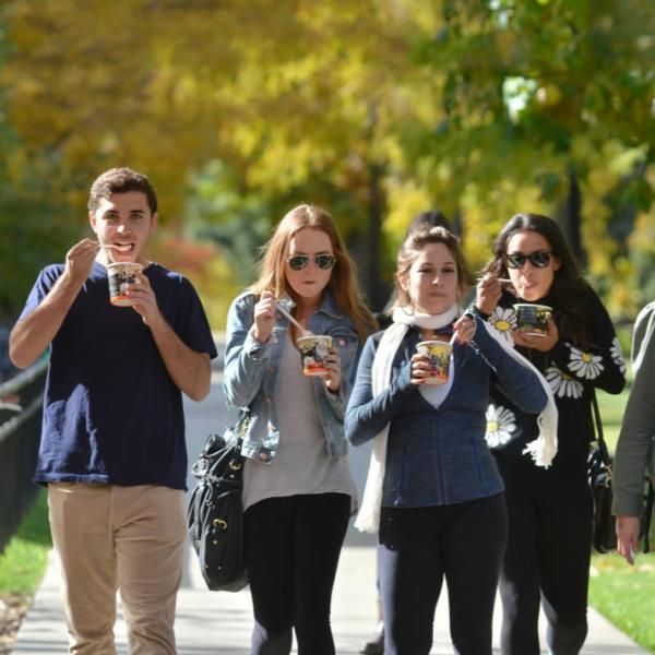 Students enjoy ice cream after a visit to University Hill. Another example of putting the sun behind subjects to make the light on them look even and clean.