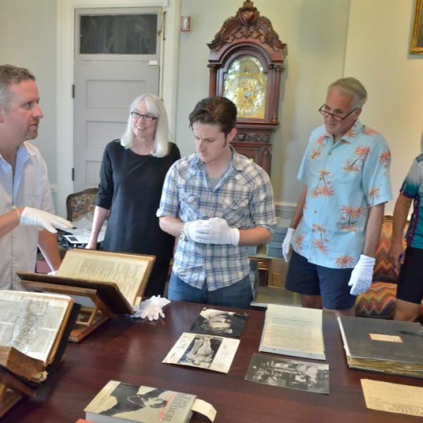 Unveiling historic documents at Old Main. Be conscious of all the elements and/or people in the images you are capturing.