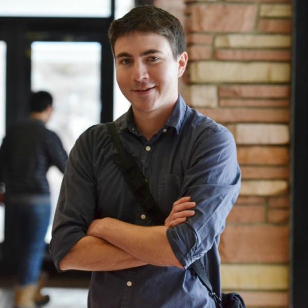 Environmental portrait of a student. A telephoto lens helps clean the background and isolate the subject.