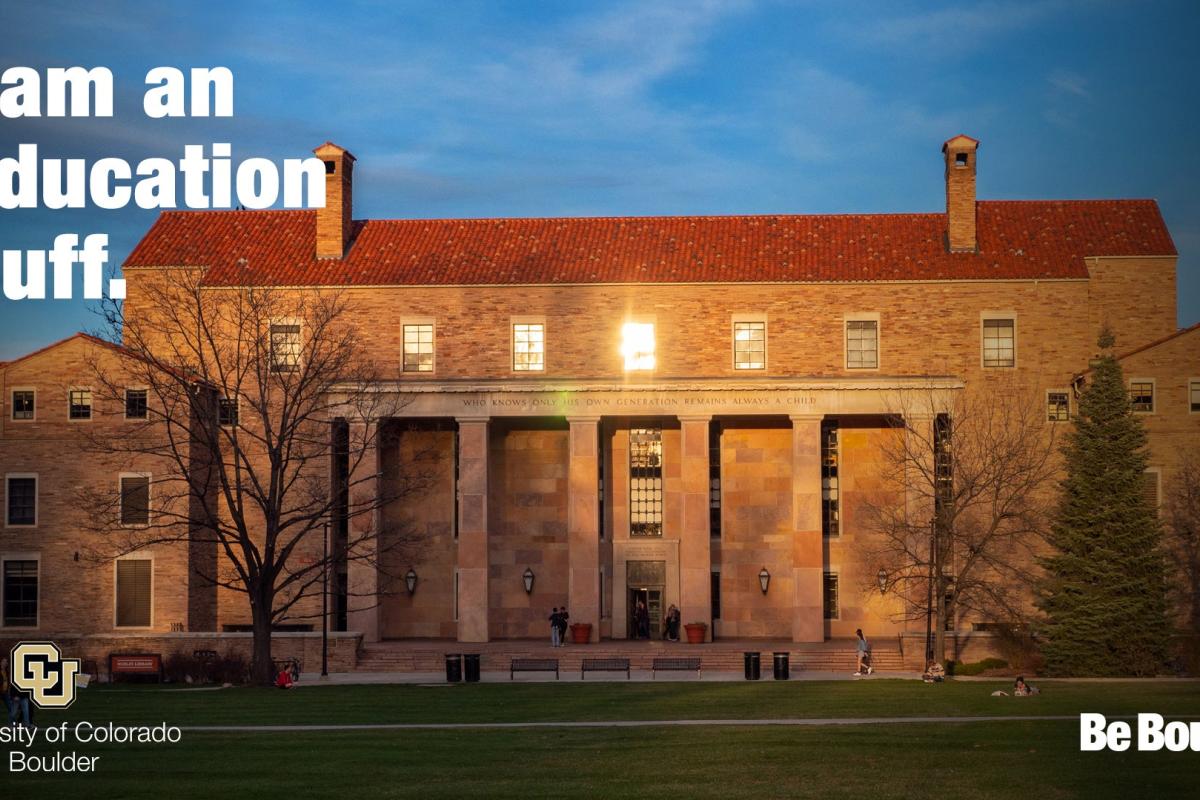West entrance to Norlin Library with "I am an education Buff"