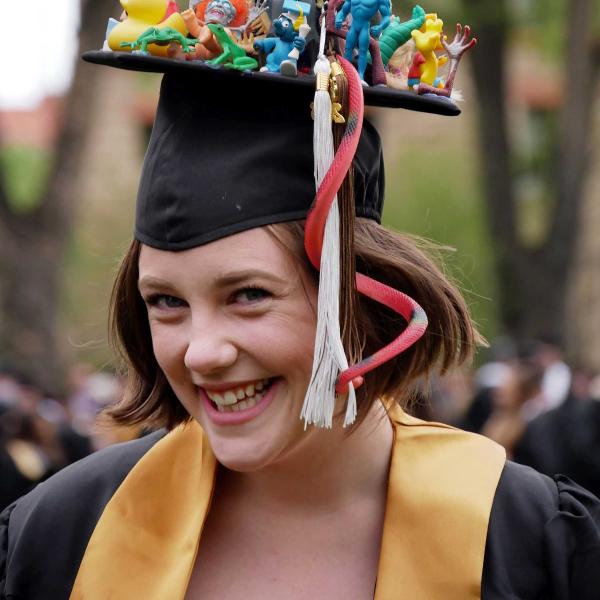A graduate shows her personality through her cap.