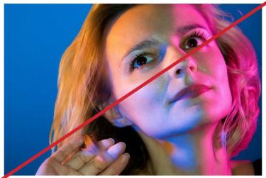 Portrait of a woman under violet lights