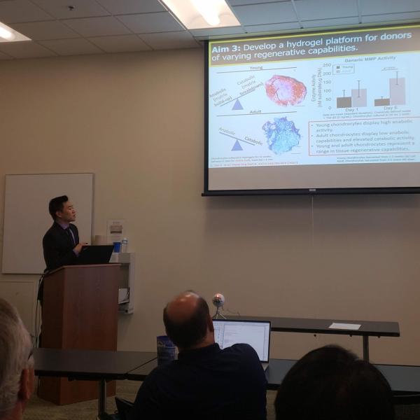 Dr. Chu defending his thesis to a committee of CU faculty